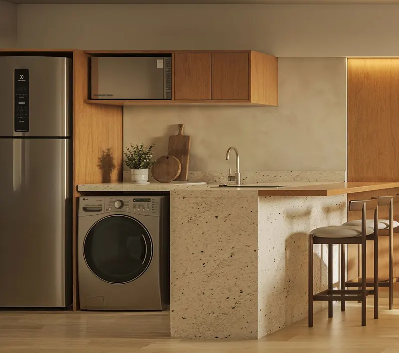 Cozinha do apartamento 501 do Be in Rio Nascimento Silva 45, com bancada, cooktop e máquina de lavar e secar